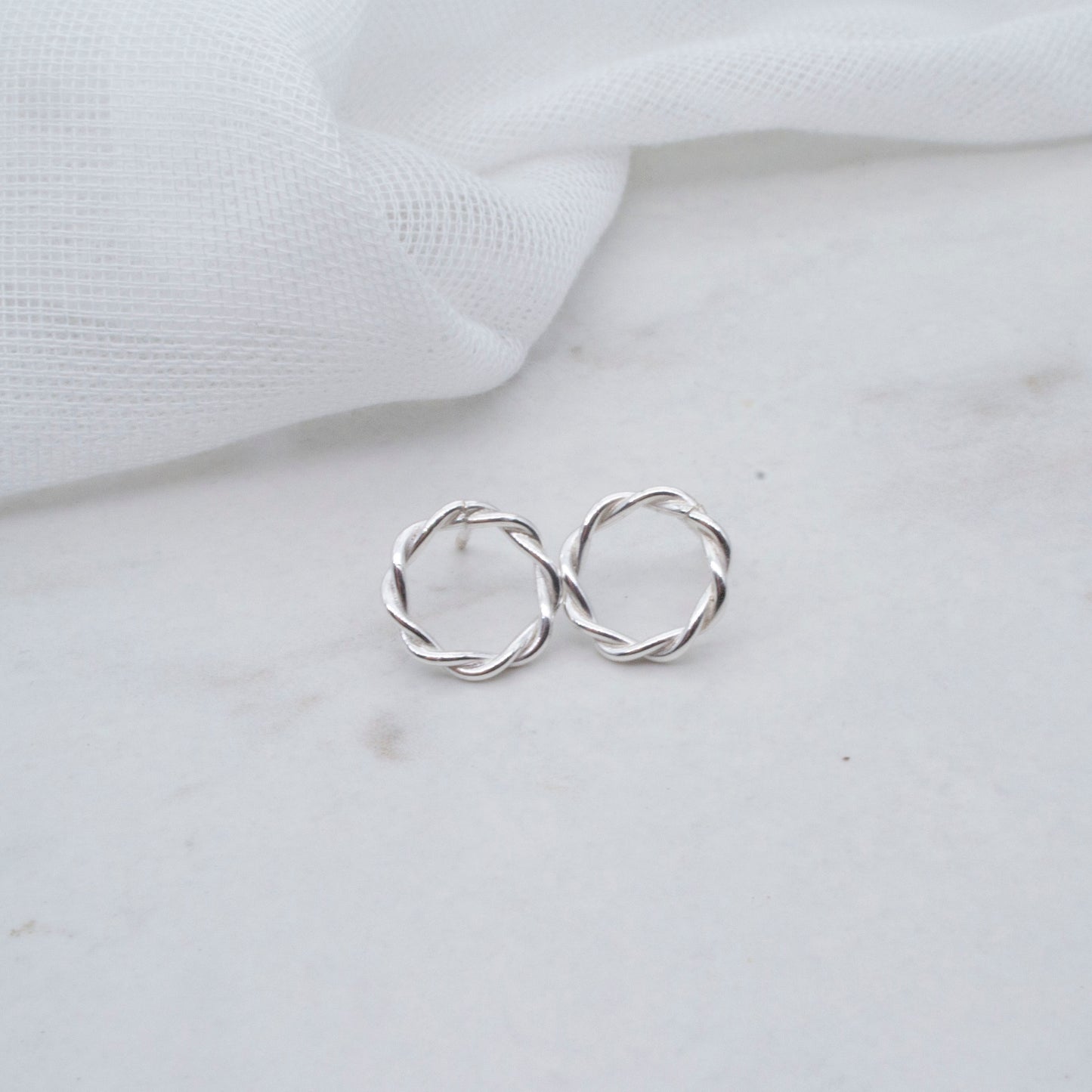 Circle twist stud earrings in sterling silver